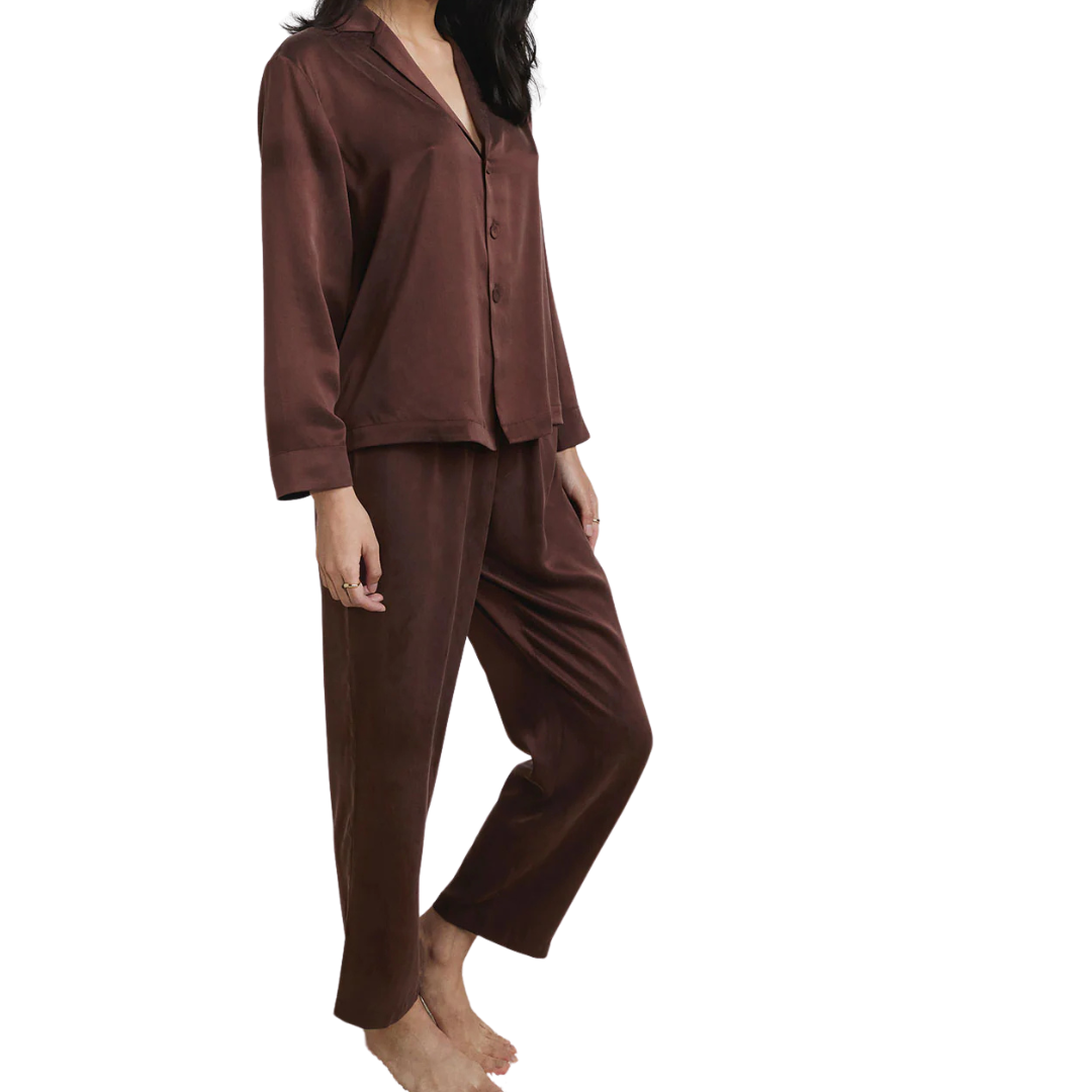 model wearing the lunya washable silk long pant set in the beautiful dozing umber at heaven on earth 