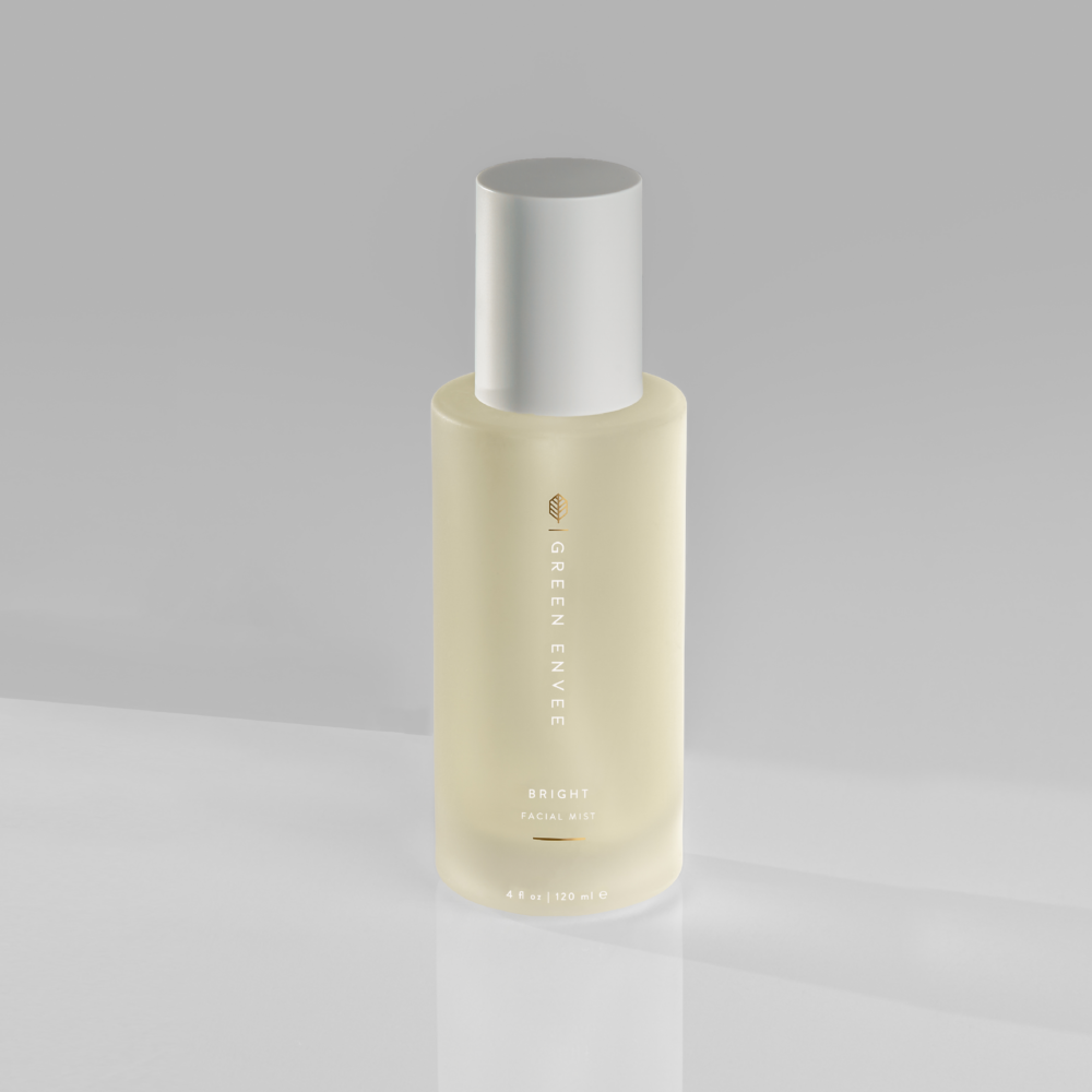 An image of a bottle of the green envee bright facial mist. 
