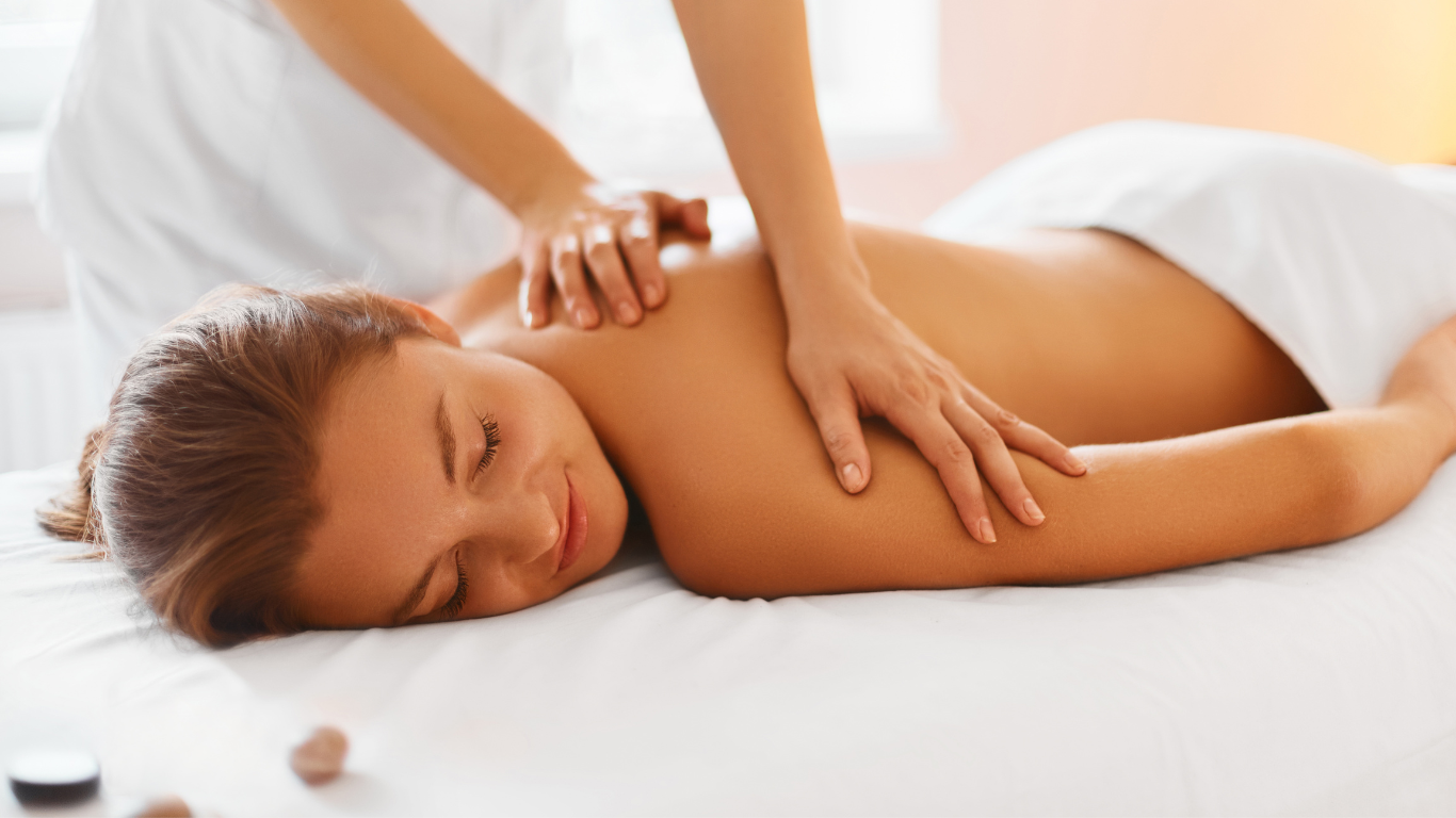 woman receiving an aspen massage for the heaven on earth aspen day spa.