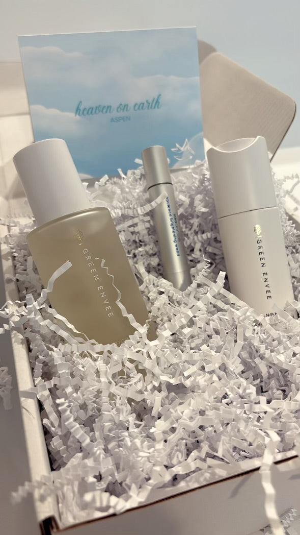 image of the heaven on earth beauty box with the green envee bright mist, the intraceuticals opulence wand mist and the green envee mandelic acid. 