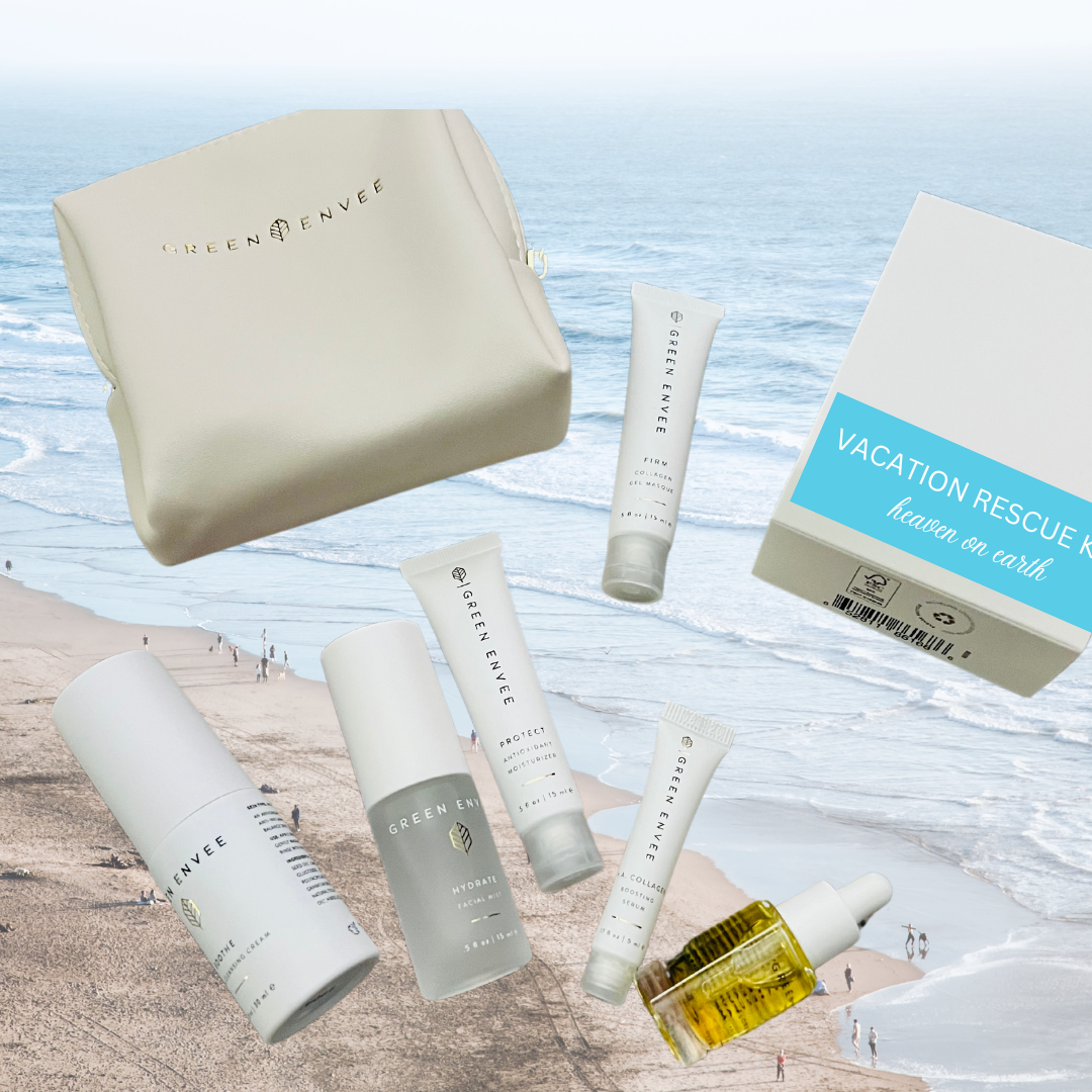 heaven on earth vacation rescue kit with green envee soothe herbal cleansing cream, bright facial mist, h.a. collagen gel serum, protect antioxidant moisturizer, and the flora elixir oil scattered on the beach
