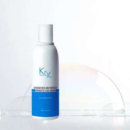 white pump bottle of the krx strengthen and protect probiotic face wash over beautiful bubbles 